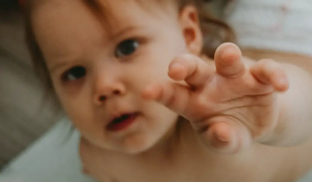 Why Does My Baby Scratch Everything? (Explained)