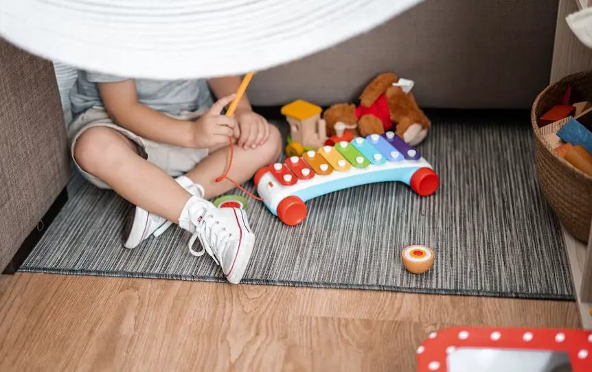 Toddler Holding Objects In Hand Constantly (Explained)